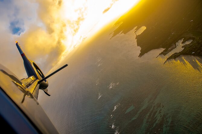 Hawaiian Odyssey: Maui, Molokai & Lanai Scenic Helicopter Tour - Maui at golden hour: coastlines, beaches, and jungle all in one sweep