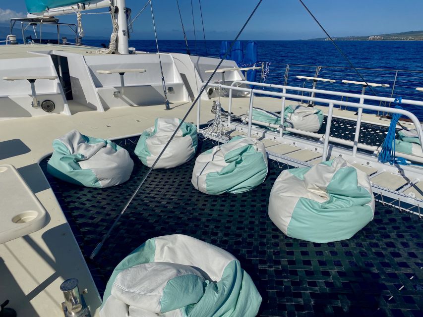 Kaanapali: Sunset Dinner Catamaran Cruise With Drinks - Boarding and Getting Comfortable on a Beach-Loading Boat