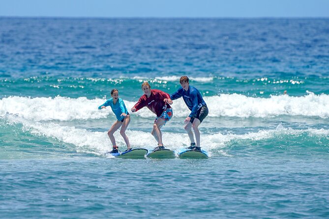 Semi Private Surf Lessons with Experienced Coaches - Boards, Booties, Rash Guard Shirts, and Board Rash Reality